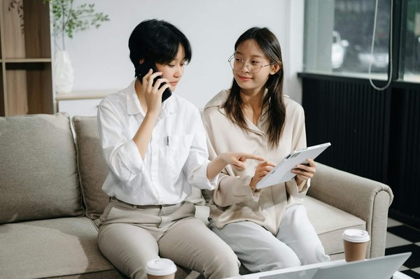 What strategies can be used to enhance the marketability of real estate projects with green and sustainable features?